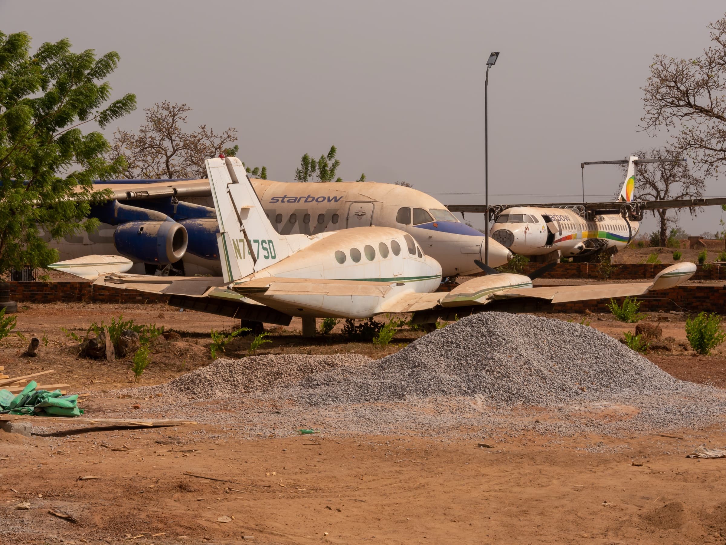 Retired aircraft repurposed as installations at Red Clay Studio, Tamale