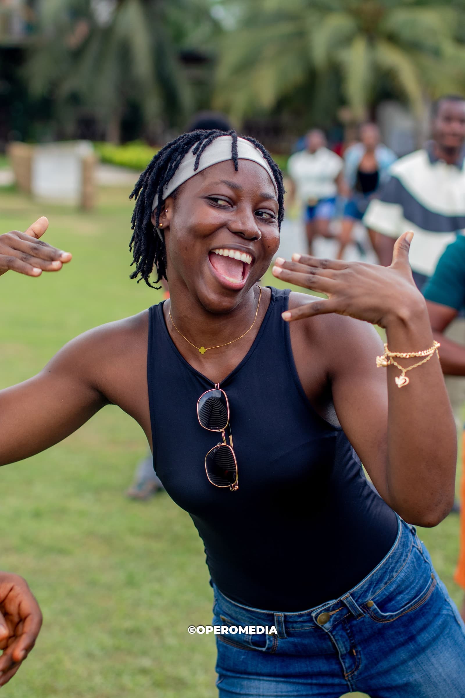 A guest laughing during happy hour
